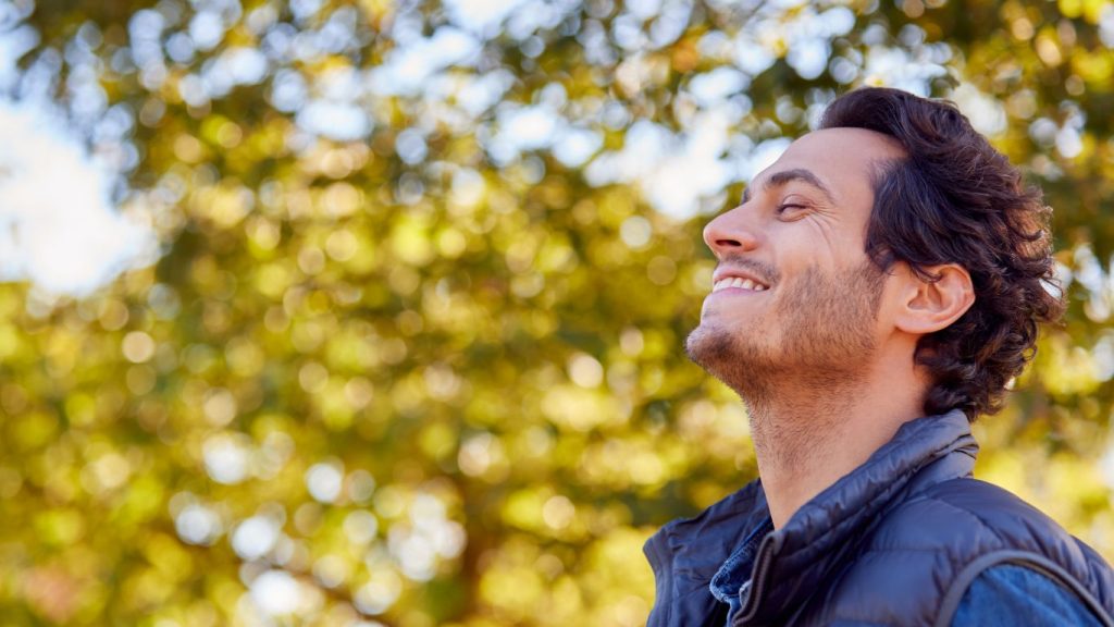 Man looking relaxed and smiling