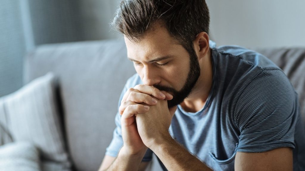 Image of man looking overwhelmed