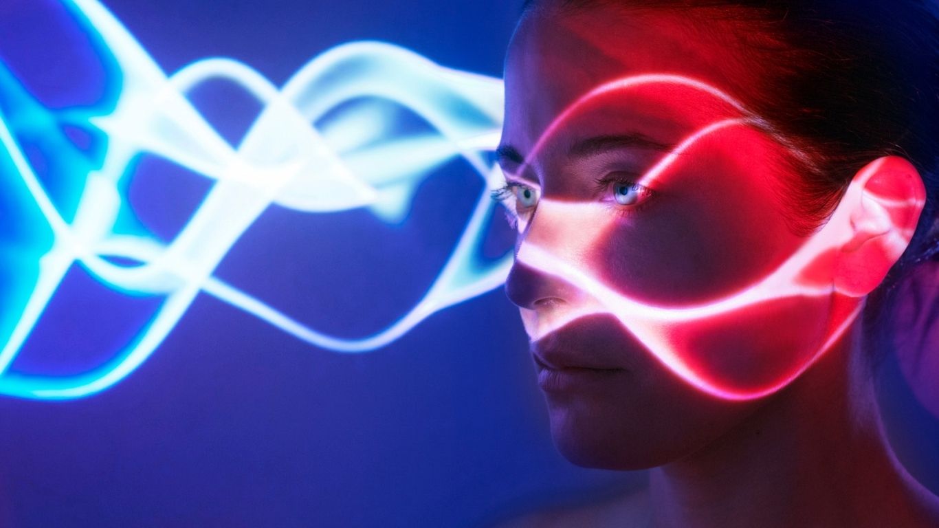 Image of a woman's face with waves superimposed