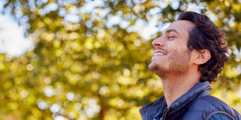 Man looking relaxed and smiling