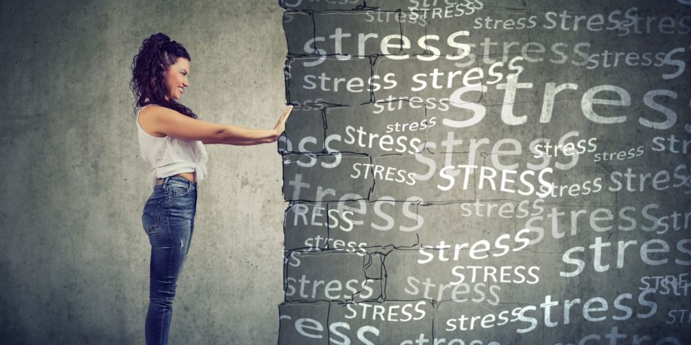 Image of a woman pushing the word stress