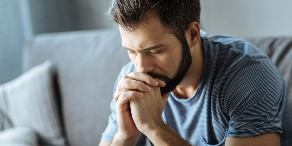Image of man looking overwhelmed